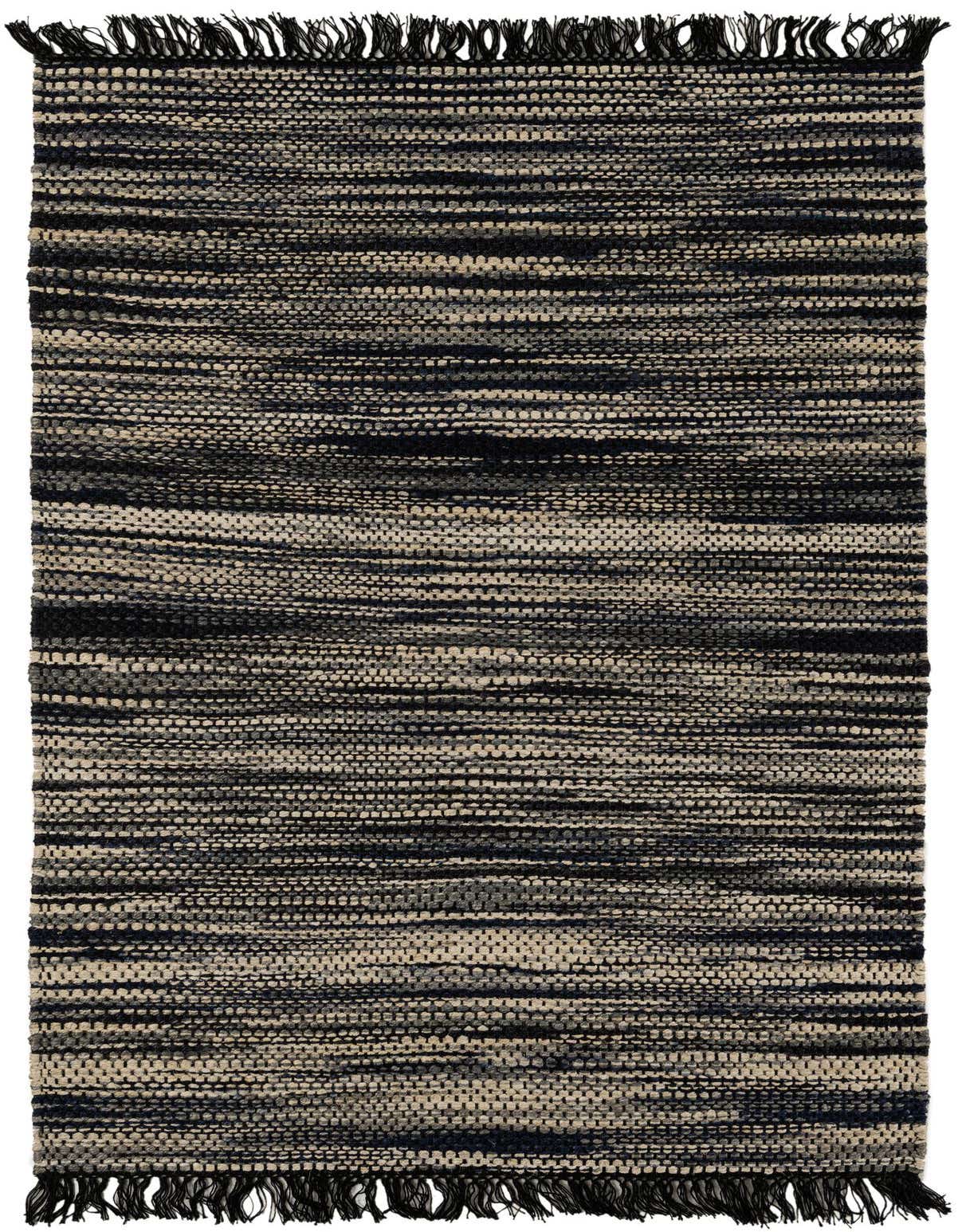 A 5x8 rectangular Chunky Jute rug featuring a textured, abstract pattern in varying shades of blue, ivory, and cream with fringed ends.