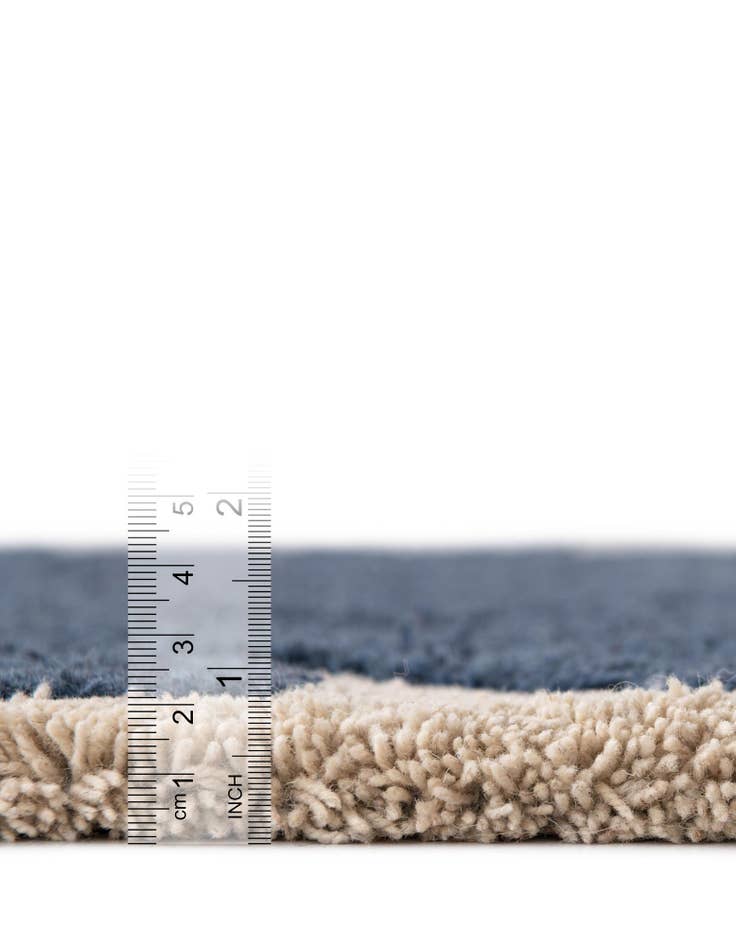 Detail image of  4' 1 x 6' 1 Handtufted Wool Rug