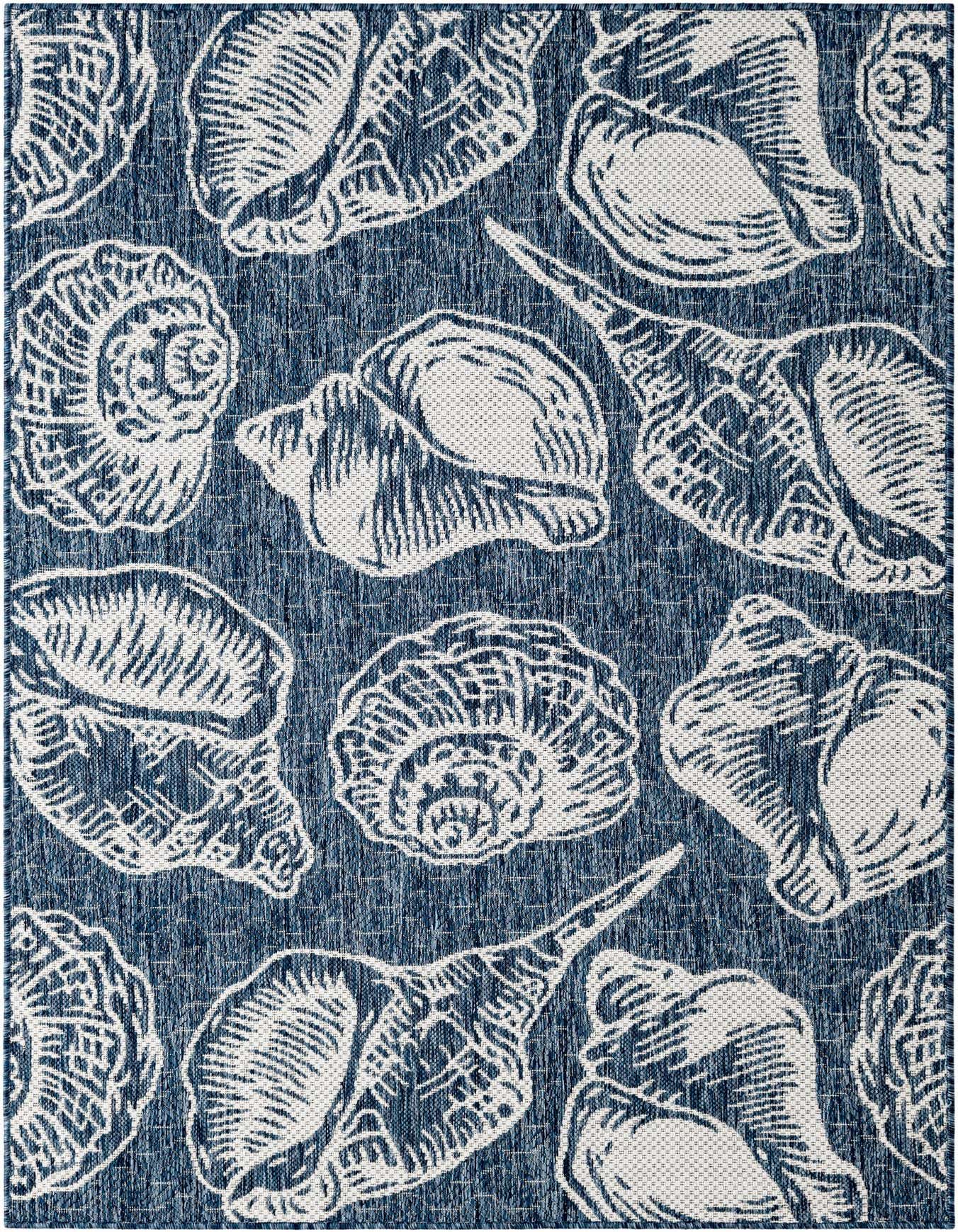 A 4x6 rectangular blue and ivory coastal rug featuring various seashell patterns, suitable for indoor/outdoor use.