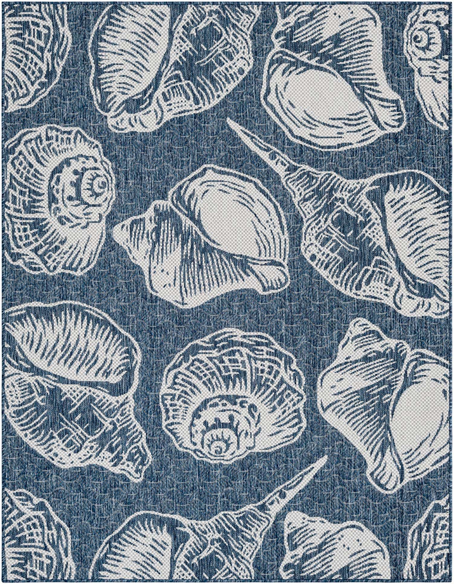 A 5x7 rectangular indoor/outdoor rug featuring a modern coastal pattern of ivory seashells on a textured blue background.