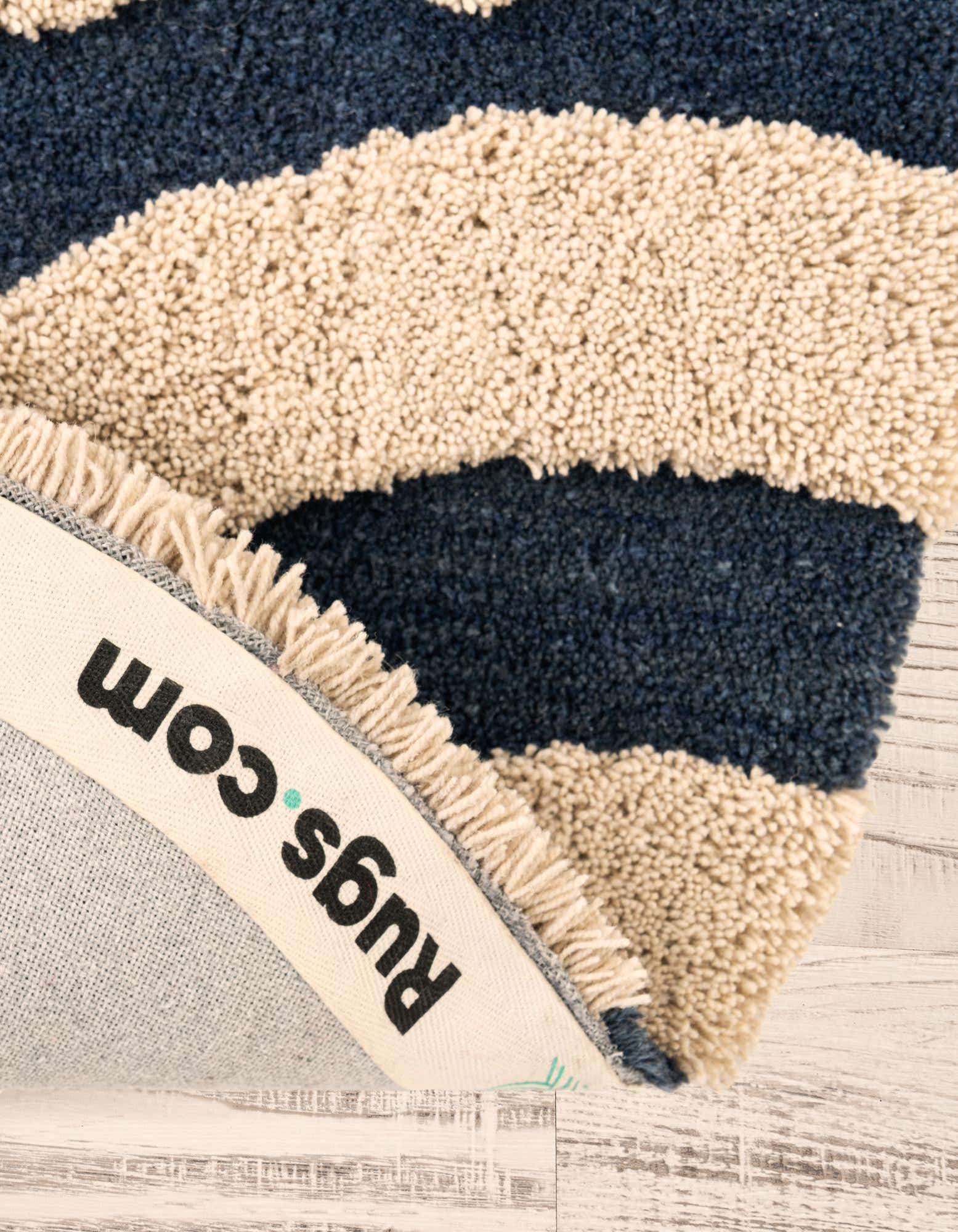 Primary image  4' 1 x 4' 1 Handtufted Wool Round Rug