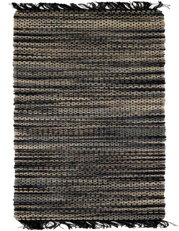 A close-up of a Chunky Jute 8 Ft Runner rug, featuring a textured flatweave pattern in shades of blue, ivory, and cream, with black fringe.