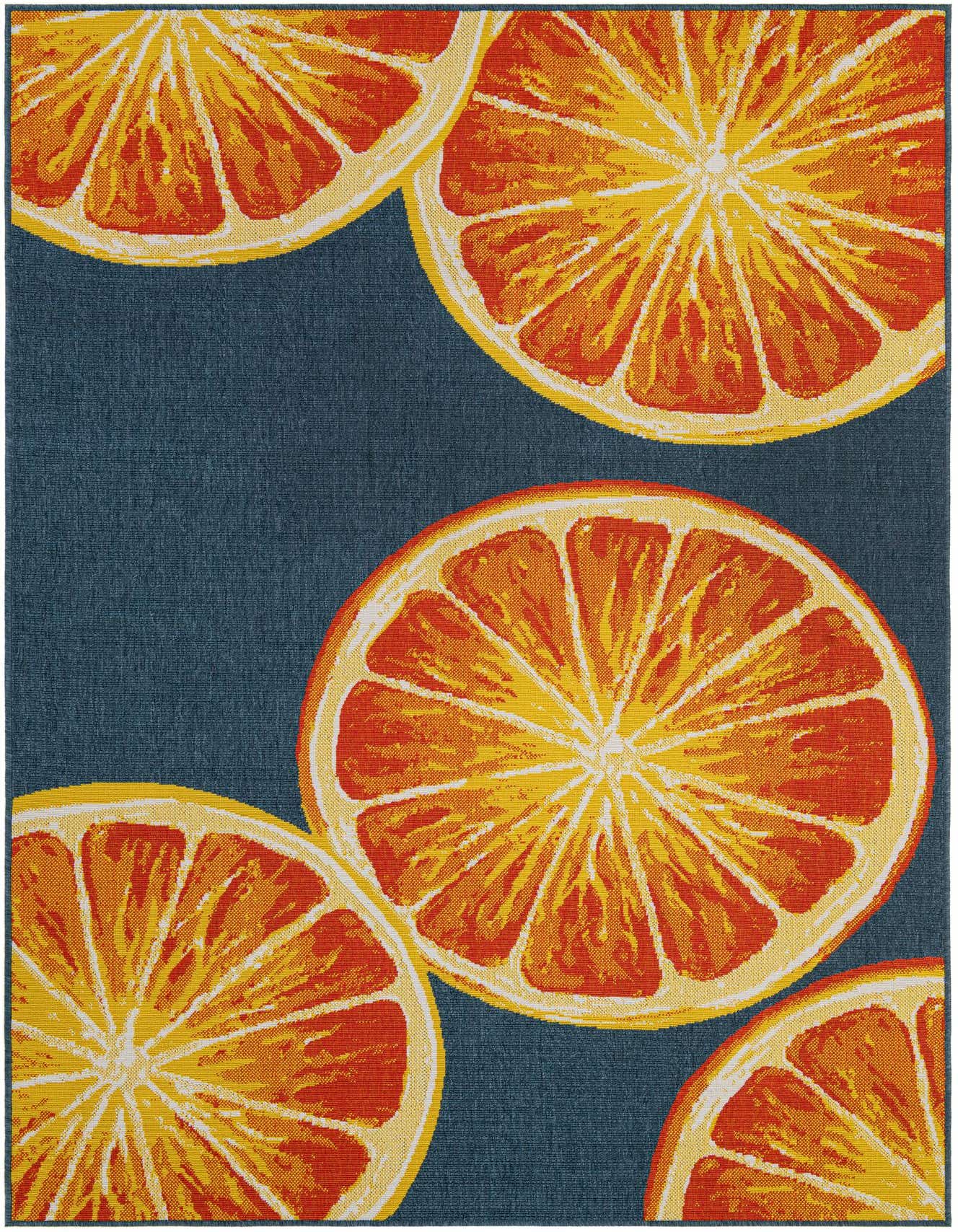 A 6x9 rectangular rug featuring a vibrant modern pattern of large orange and yellow citrus slices on a navy blue background.