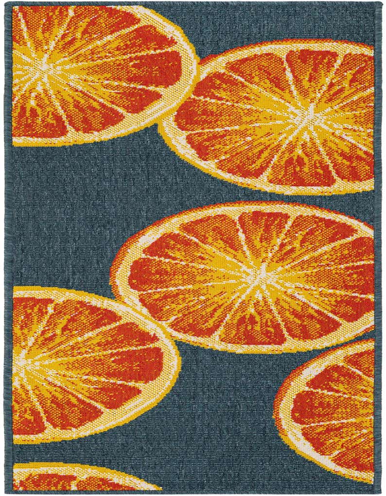 A 5 ft runner rug featuring a modern abstract pattern of large orange and yellow citrus slices on a navy blue background.