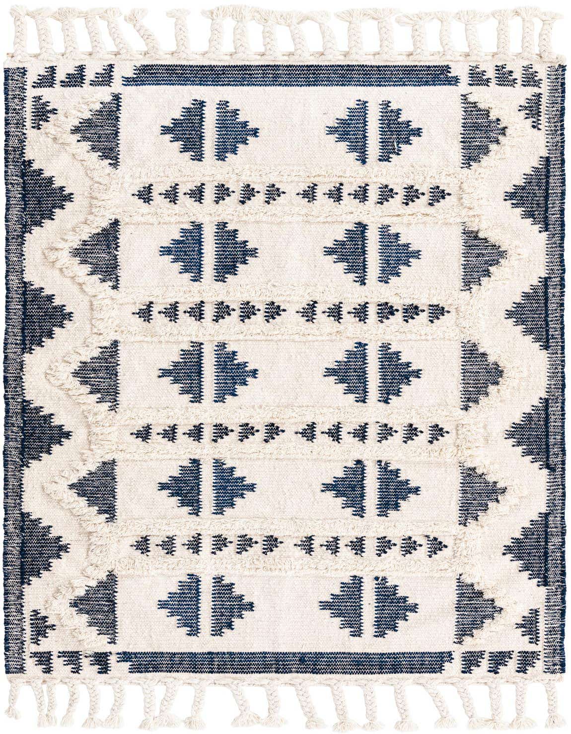A 4x6 rectangular Rugs.com Arizona rug featuring a tribal pattern in white and deep blue, with shag texture and braided tassels.
