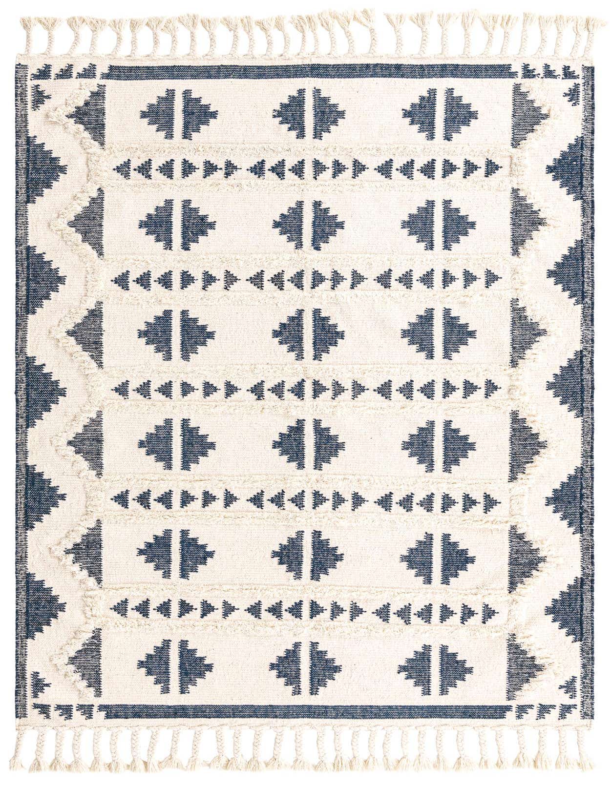 A 6x9 rectangular Arizona rug with a modern tribal pattern in navy blue and off-white, featuring shag texture and decorative tassels.