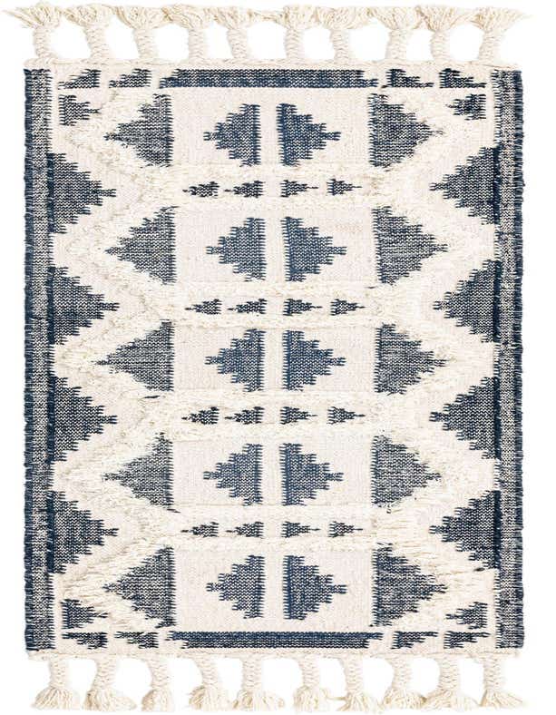 A 6 ft runner rug with a tribal pattern in blue and white, featuring shag texture and braided tassels.