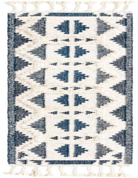 A handmade 8 ft runner rug from the Arizona collection, featuring a modern tribal pattern in blue and white shag, ideal for hallways.