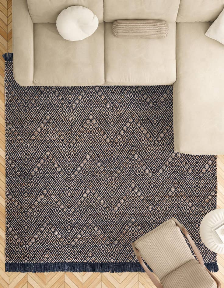 Detail image of  5' 1 x 5' 1  Hand Braided Jute Square Rug