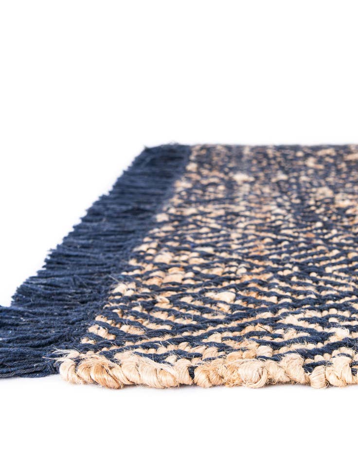 Detail image of  5' 1 x 5' 1  Hand Braided Jute Square Rug