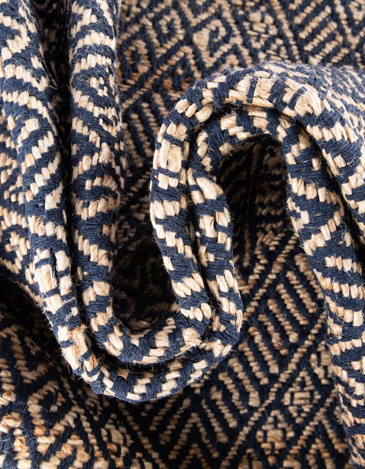 Detail image of  5' 1 x 5' 1  Hand Braided Jute Square Rug