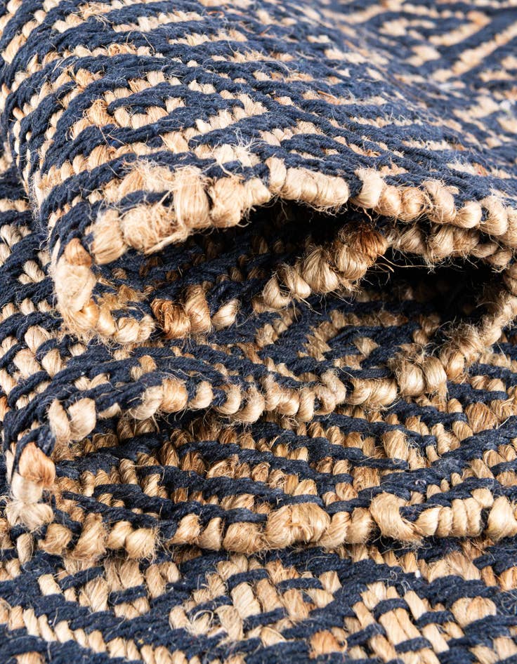Detail image of  5' 1 x 5' 1  Hand Braided Jute Square Rug