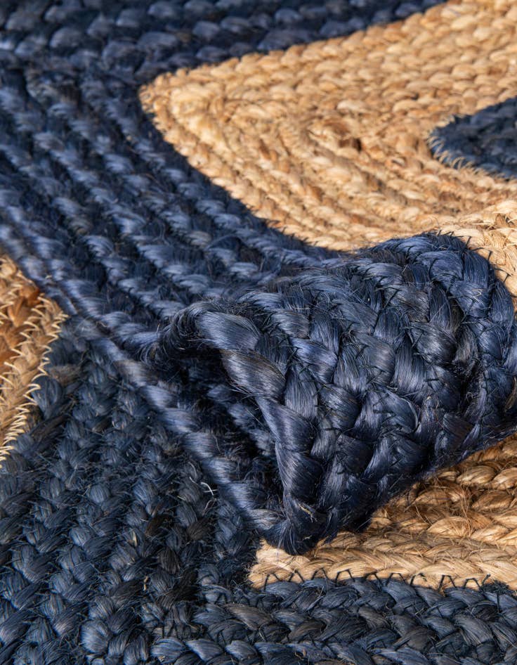 Detail image of  4' 1 x 6' 1  Hand Braided Jute Rug