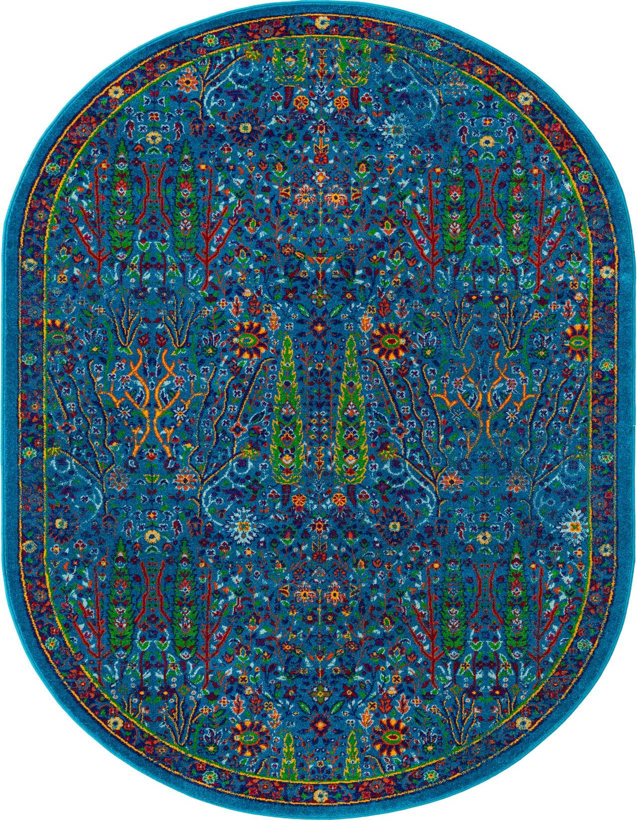 A 5'3 x 8'0 oval rug from the Calypso Collection, featuring a vibrant floral and botanical pattern in shades of blue, red, orange, and green on a deep blue background.