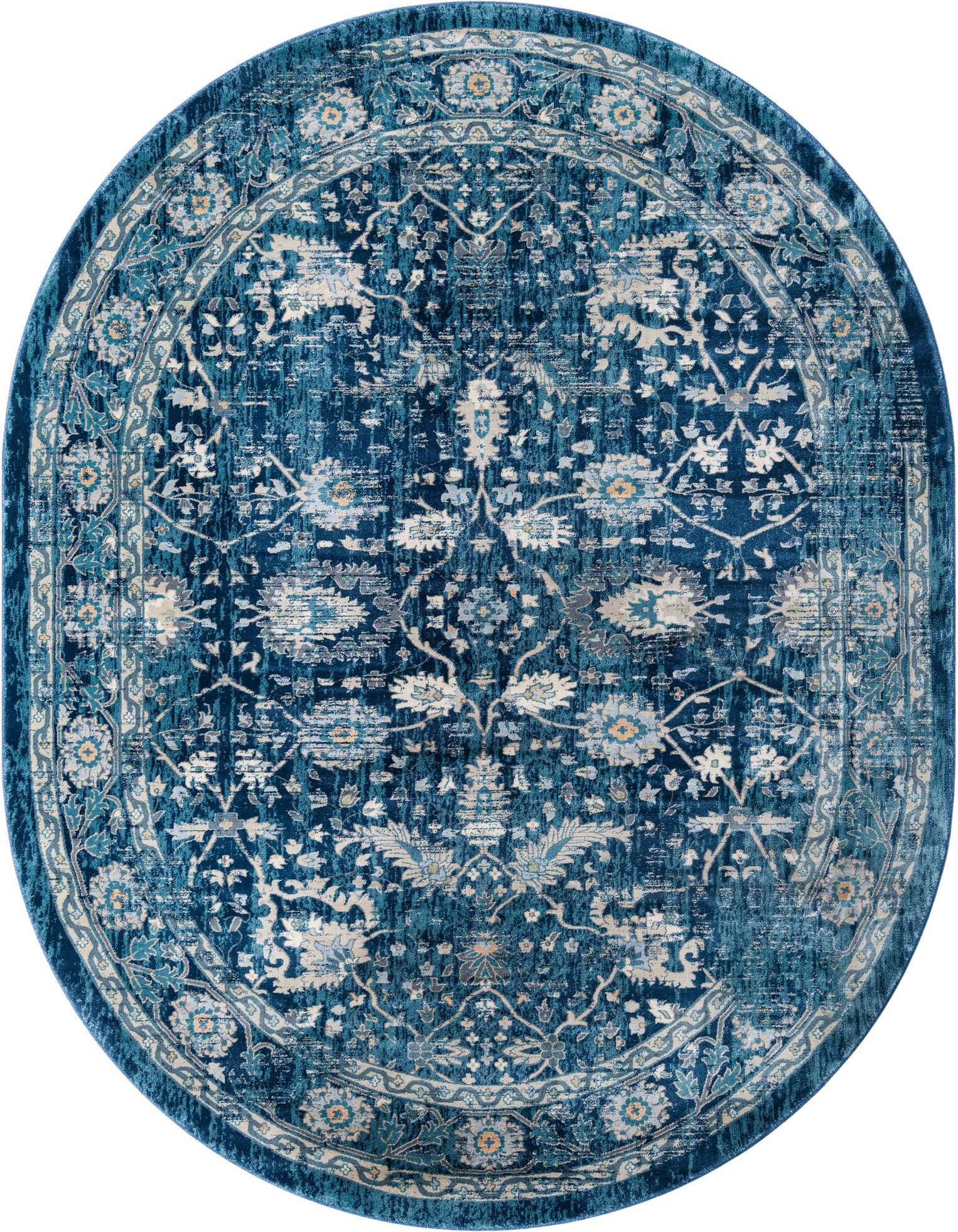 An oval 7' 10 x 10' 0 navy blue rug with a distressed traditional floral pattern in lighter blues, grey, and cream.