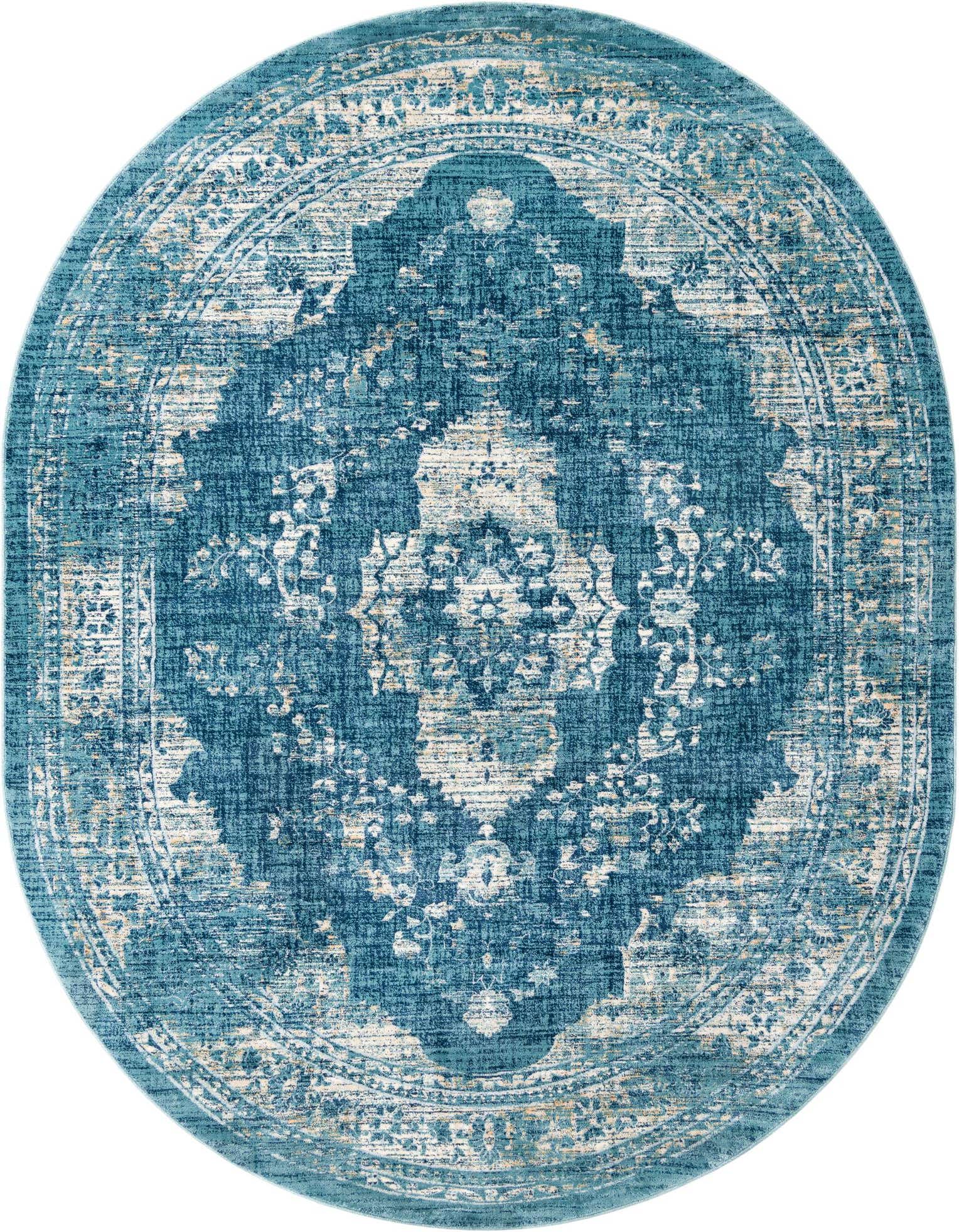 An oval 7' 10 x 10' 0 Dahlia rug featuring a distressed traditional medallion pattern in varying shades of blue and cream.
