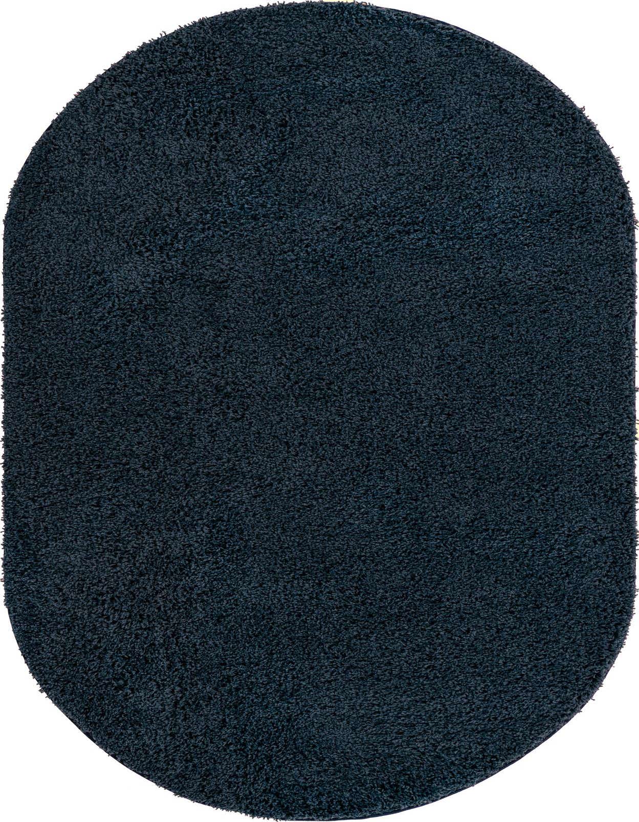 A plush, oval navy blue shag rug, 5' 0 x 8' 0, with a deep, textured pile, suitable for a modern indoor space.