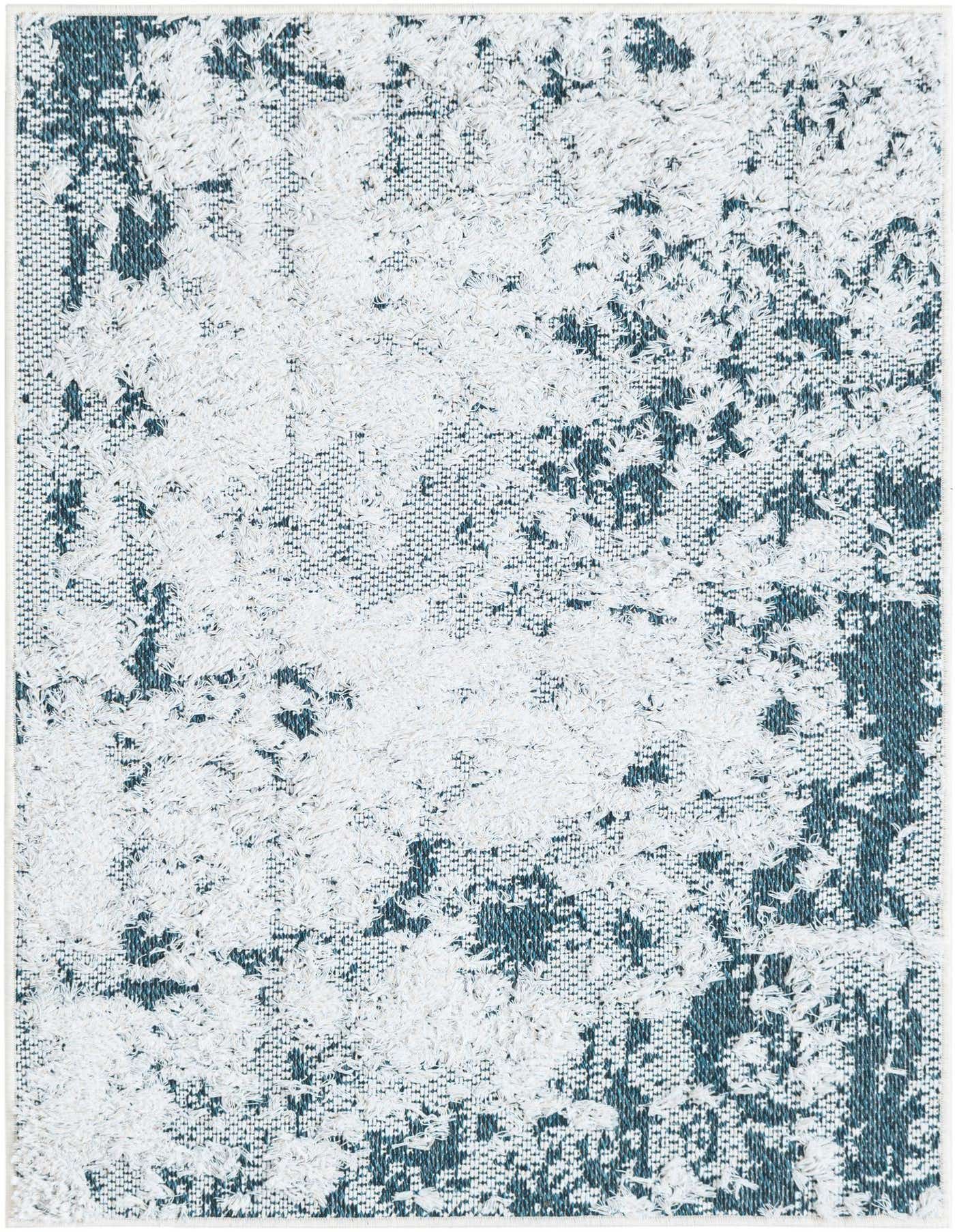 A 2x3 rectangular Rugs.com Abbey rug featuring an abstract pattern in varying shades of blue and white, with a textured, medium pile.