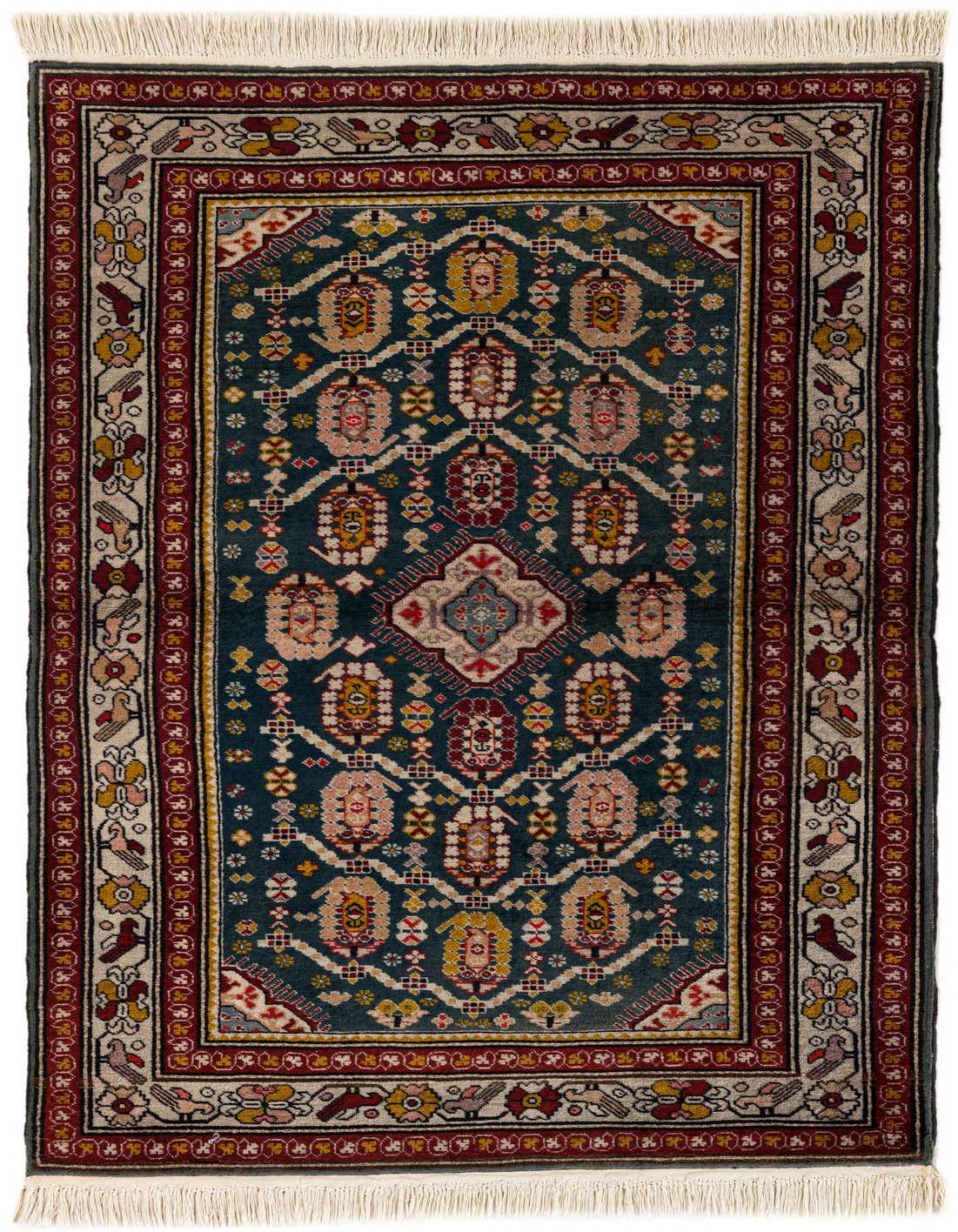 A 3x5 rectangular Anatolian wool rug in traditional Oriental style, featuring a deep blue field with intricate floral and medallion patterns in red, gold, and cream, framed by a multi-layered border.