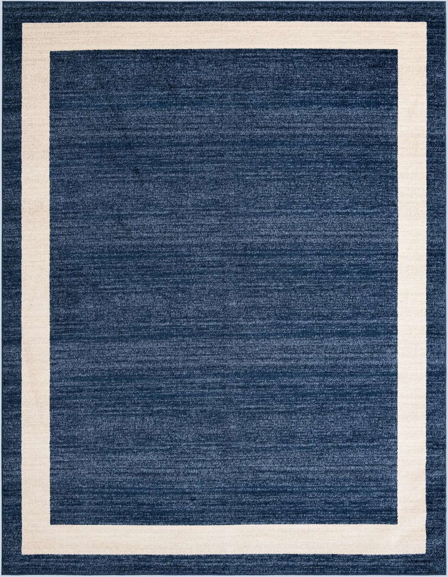 A 9x12 rectangular navy blue area rug with a clean, wide cream border, suitable for a living room.