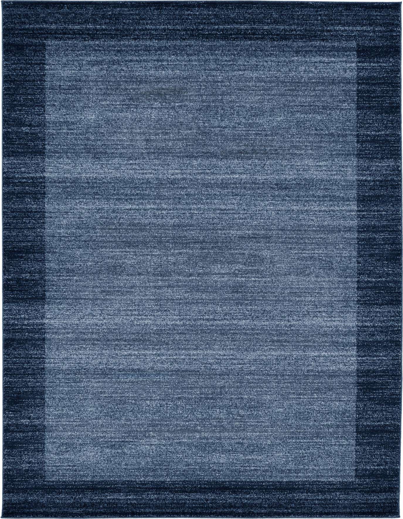 A 6x9 rectangular Angelica rug in varying shades of blue, featuring a solid contemporary design with a darker blue border.