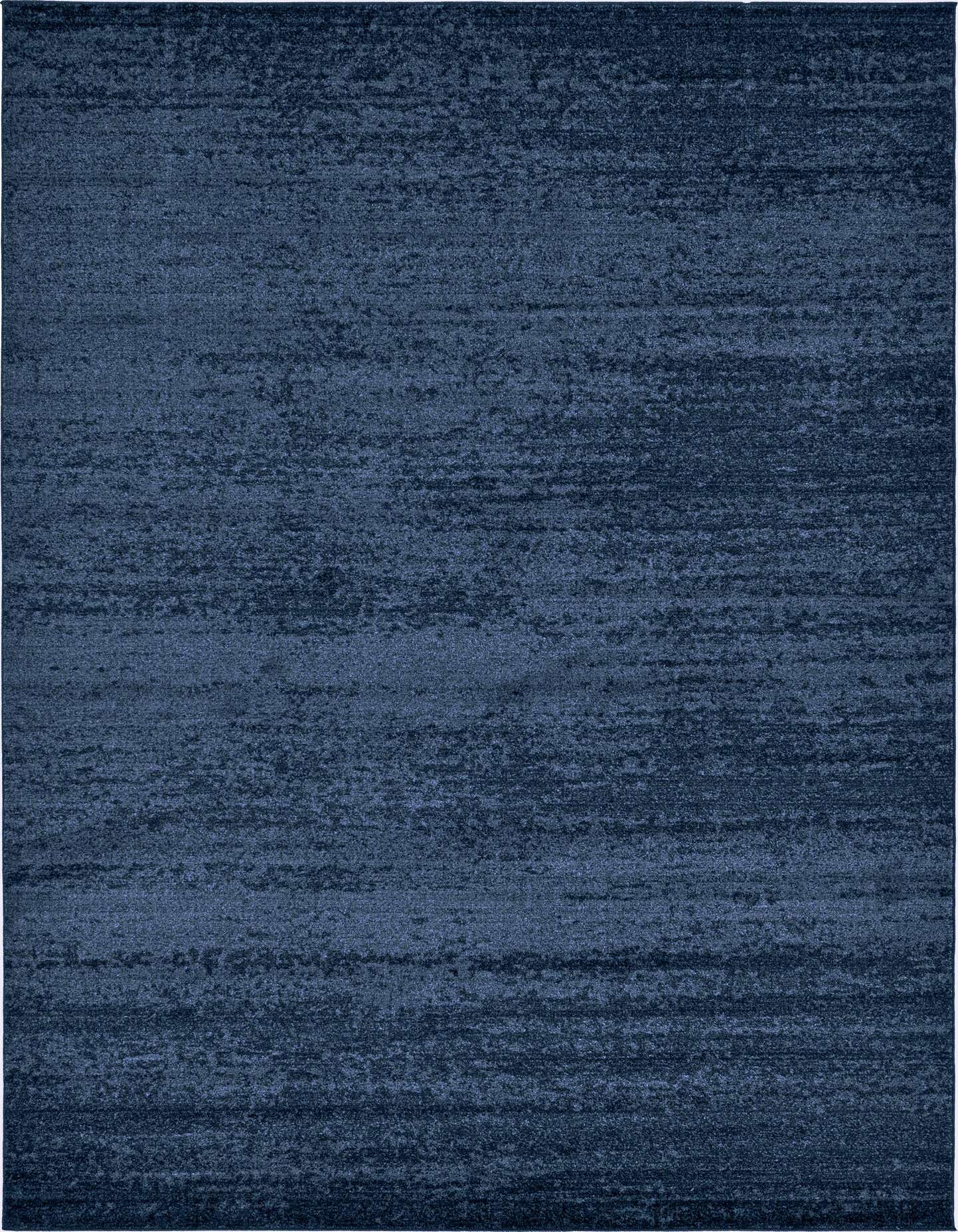 An 8x11 rectangular navy blue area rug with a subtle, textured contemporary pattern, suitable for a living room.