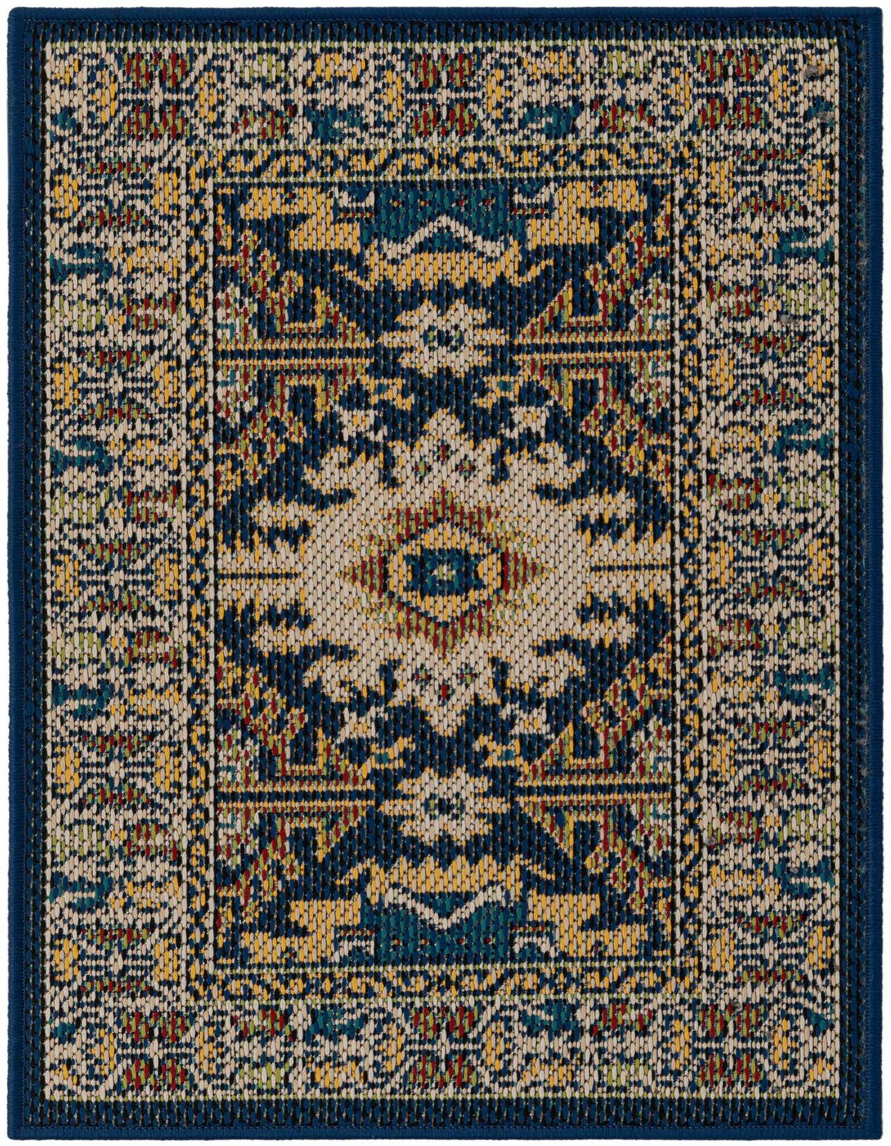 A 2x3 rectangular Baja Outdoor rug featuring a traditional navy blue, yellow, and cream pattern with a dark blue border.