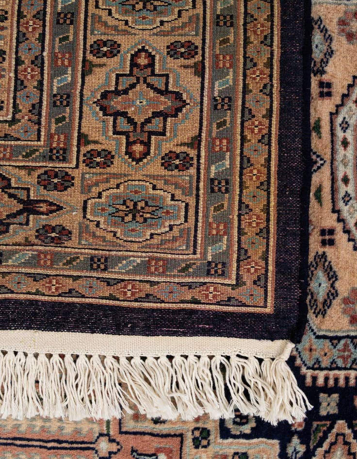 Detail image of  4' 3 x 6' 2  Hand Knotted Bokhara Oriental Wool Rug