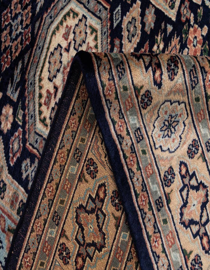 Detail image of  4' 3 x 6' 2  Hand Knotted Bokhara Oriental Wool Rug