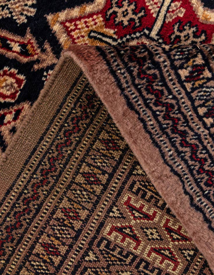 Detail image of  4' 2 x 6' 1  Hand Knotted Bokhara Oriental Wool Rug
