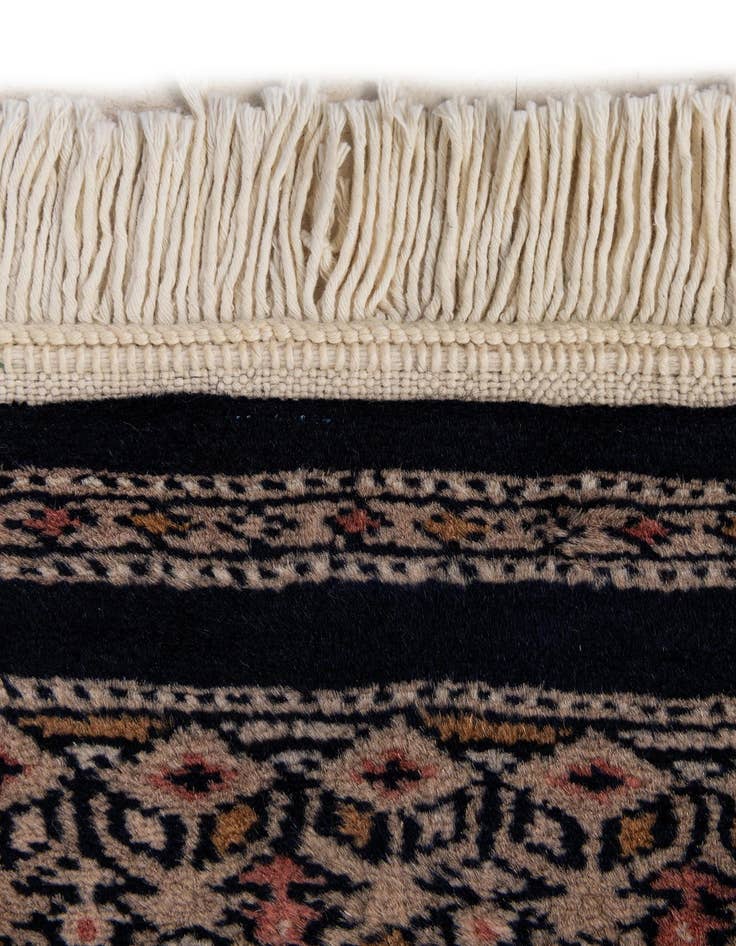 Detail image of  4' 3 x 5' 11  Hand Knotted Bokhara Oriental Wool Rug