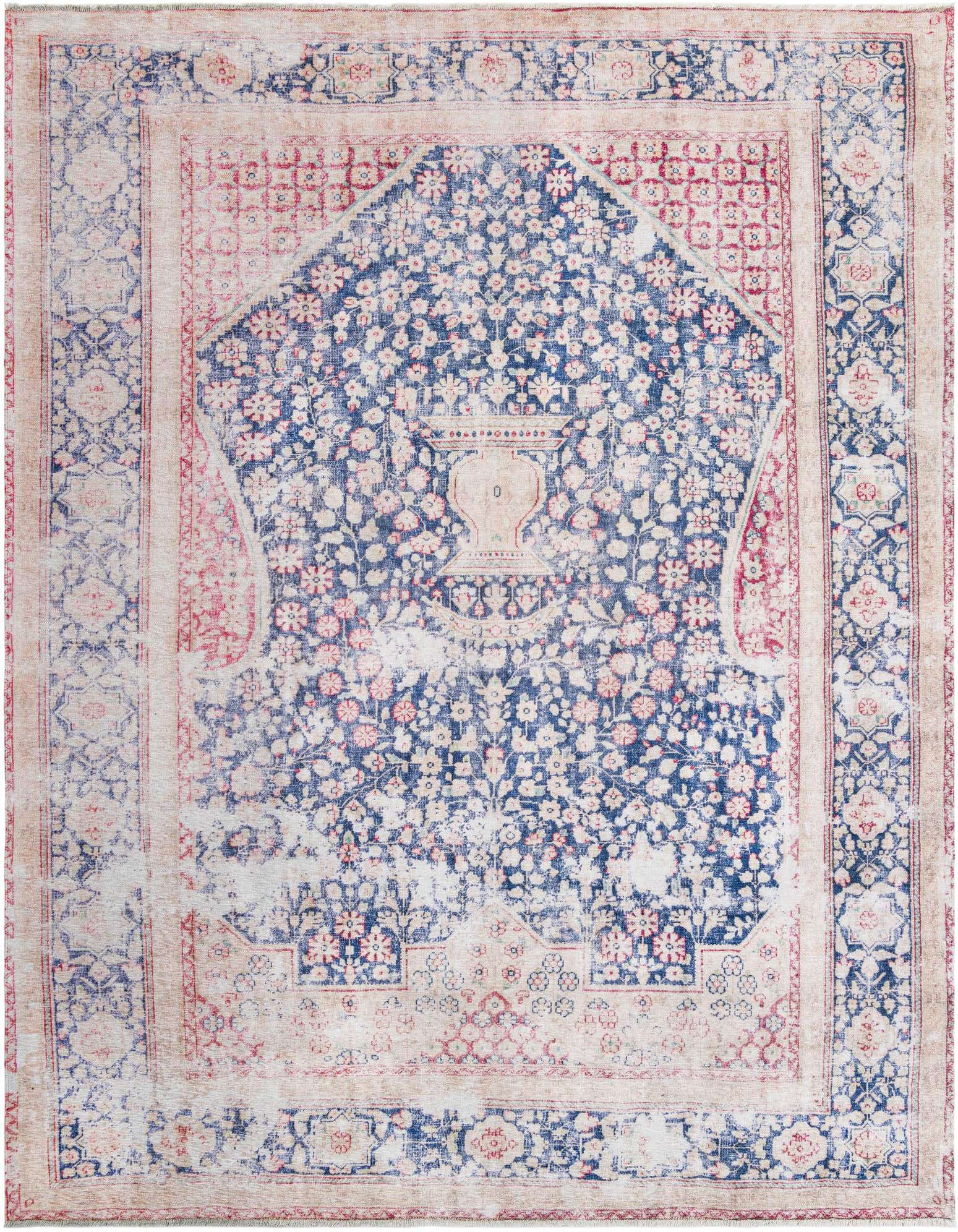 A 9x12 rectangular traditional rug with a faded vintage look, featuring a central navy blue medallion with floral patterns and a light pink and cream border.