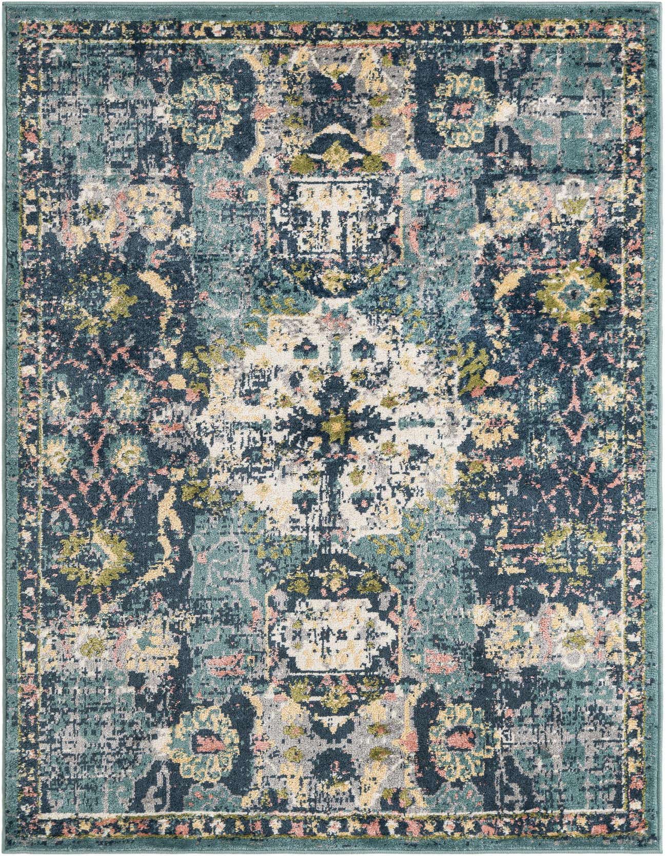 A 4x6 rectangular Charleston rug featuring a distressed vintage medallion pattern in shades of navy, teal, cream, and subtle pink.