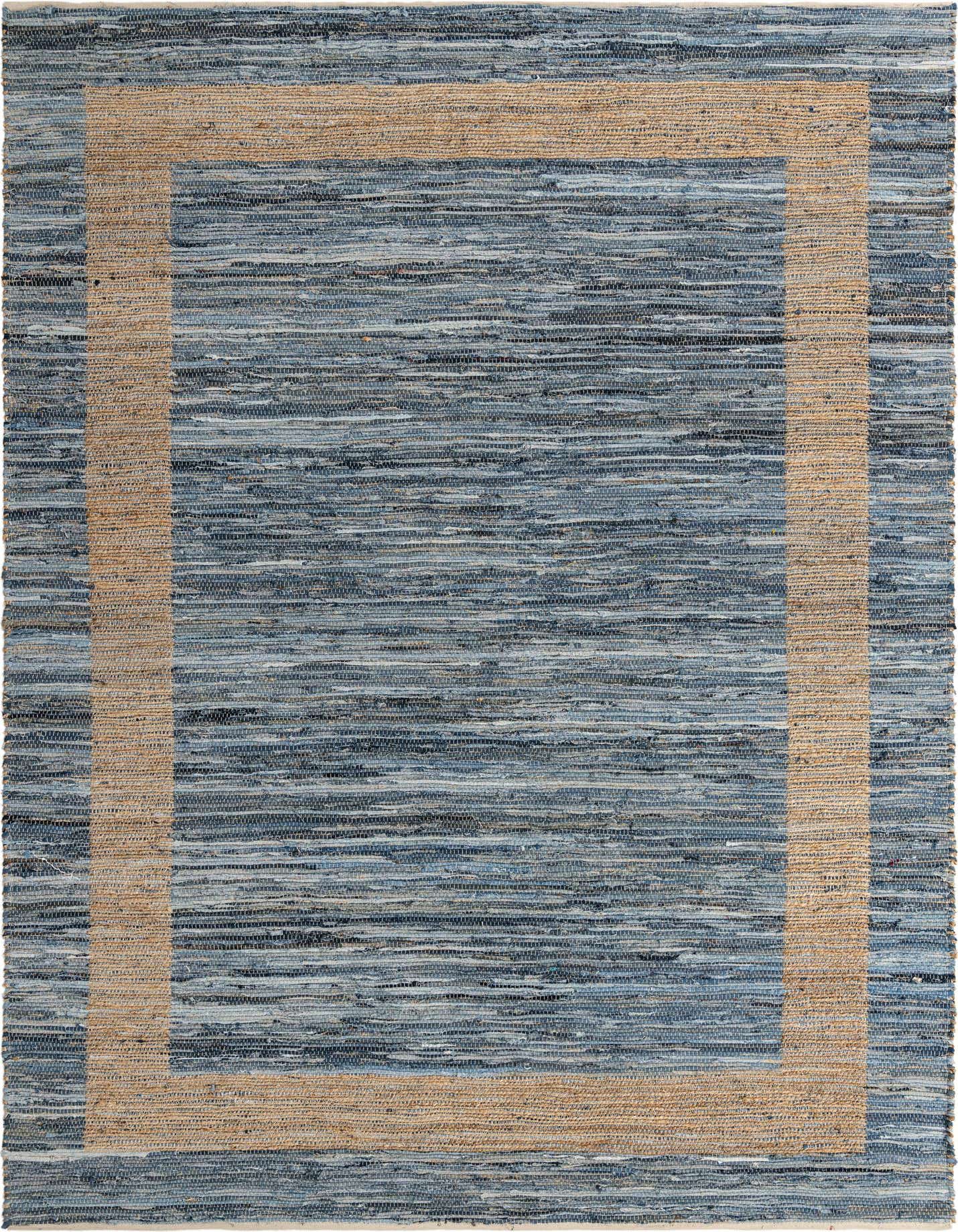 A 10x14 rectangular denim cotton and jute rug in varying shades of blue with a natural tan jute border.