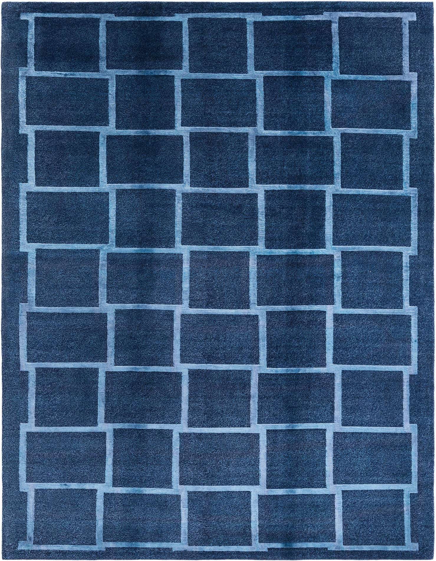 A 5x8 rectangular navy blue wool rug with a modern geometric pattern of lighter blue interlocking rectangles.