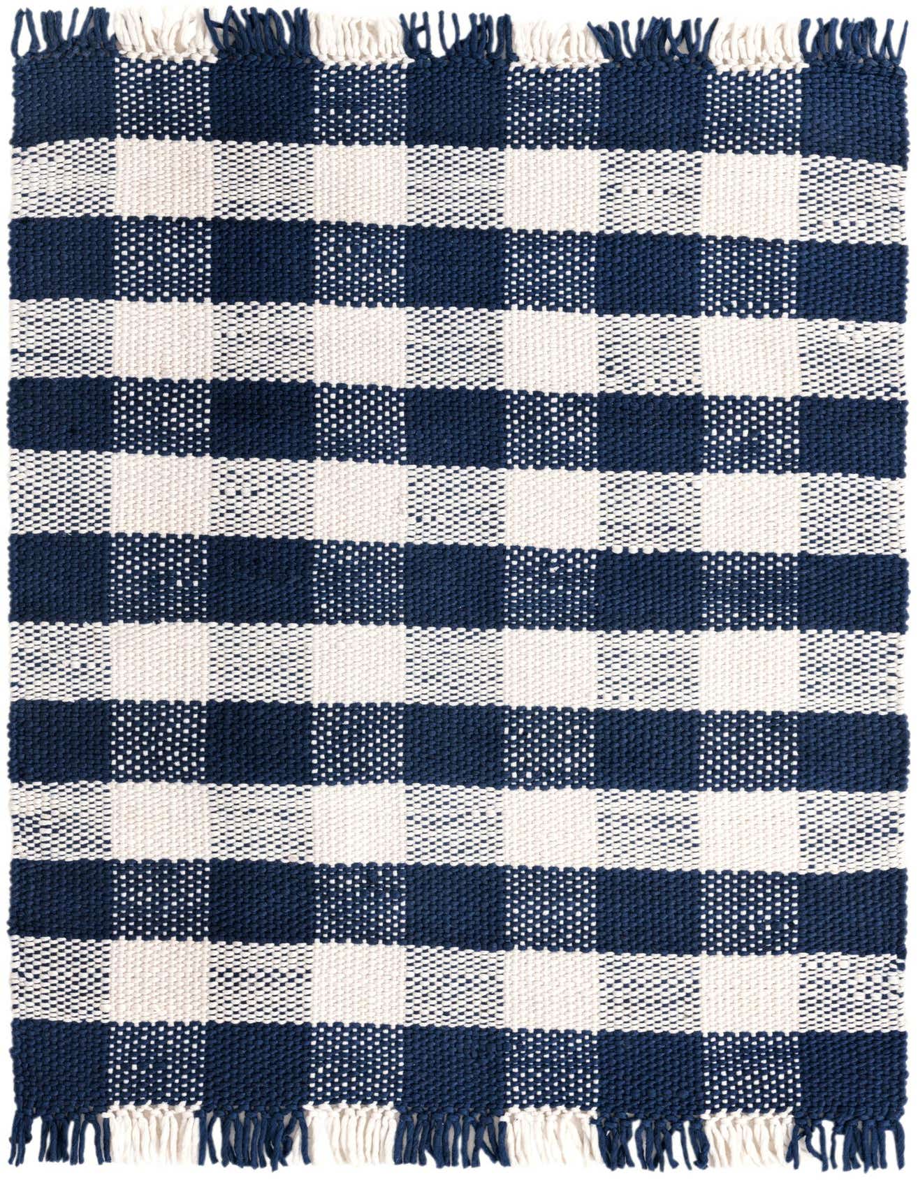 A 4x6 rectangular Eco Plaid rug featuring a bold navy blue and white checkerboard pattern with fringed edges.