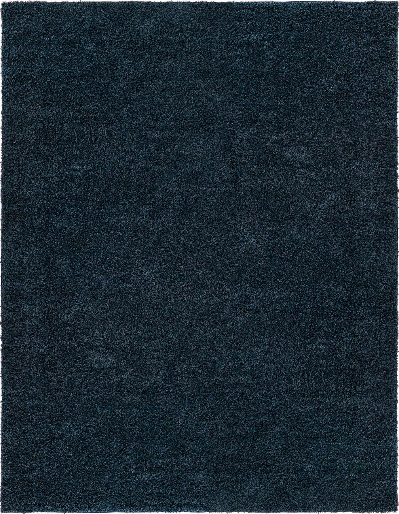 A rectangular 10x14 navy blue shag rug with a soft, textured pile, perfect for an indoor living space.