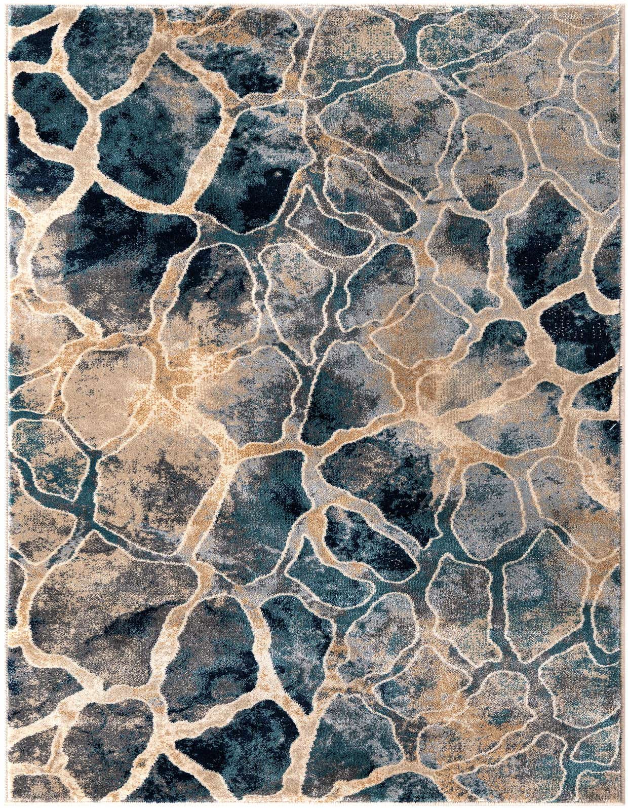 A 3x5 rectangular modern abstract rug featuring a mosaic-like pattern in varying shades of blue and gray, outlined by thin beige lines.