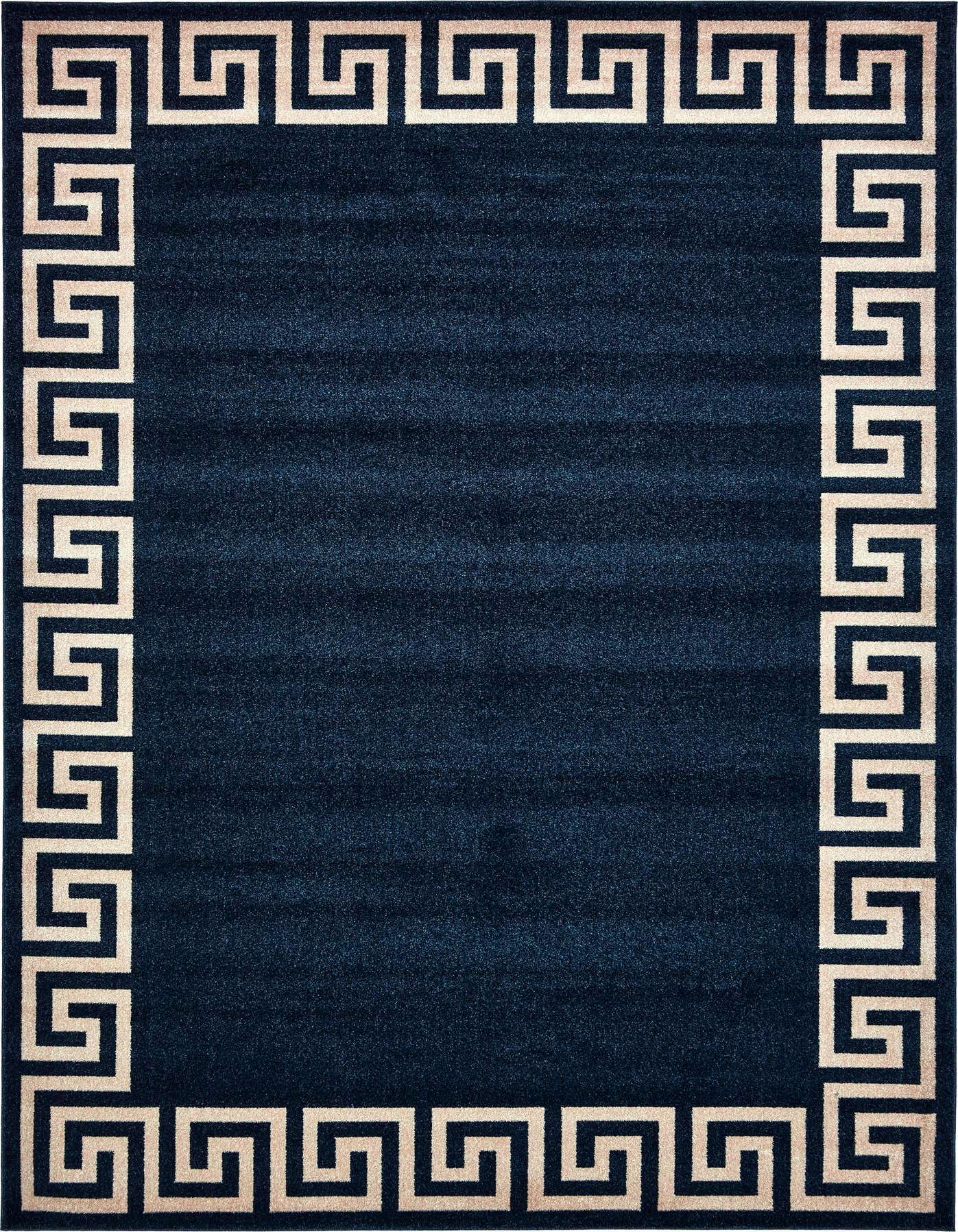 A rectangular 8x11 navy blue area rug with a cream Greek key border pattern, suitable for a living room.