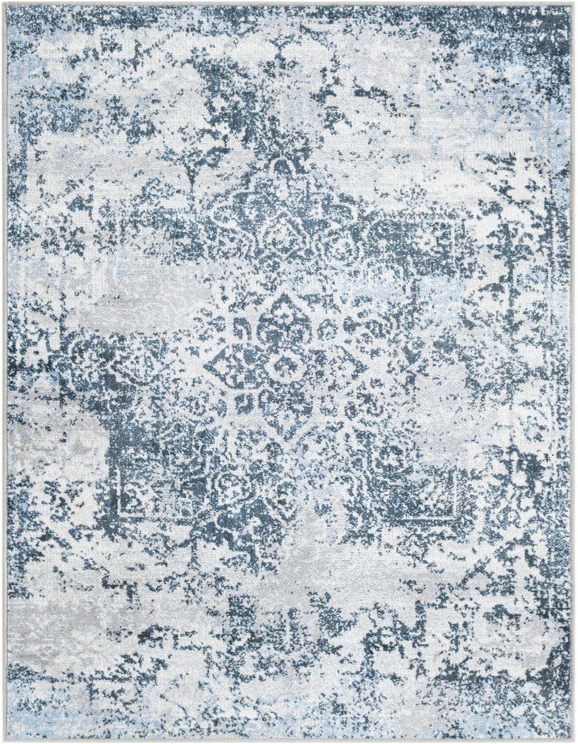 A 3x5 rectangular Kamala Washable rug featuring a distressed blue and white traditional medallion pattern.