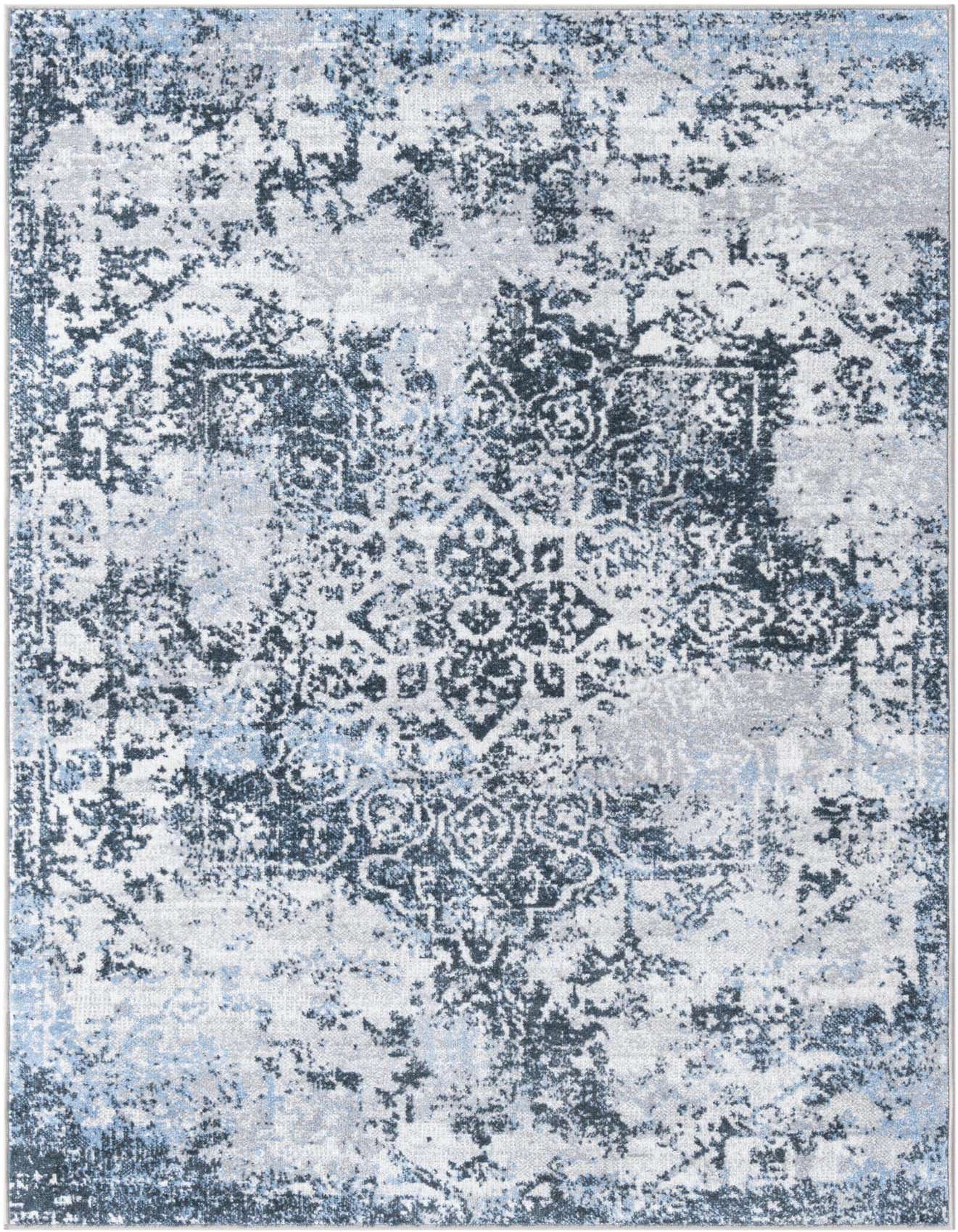 A 4x6 rectangular Kamala Washable rug featuring a distressed navy blue and light blue traditional medallion pattern on a white background.