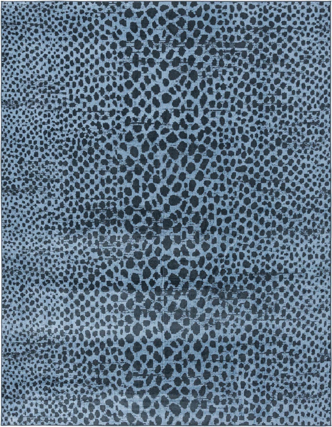 A 10x14 rectangular Kamala Washable rug featuring a modern abstract pattern of varying blue tones.