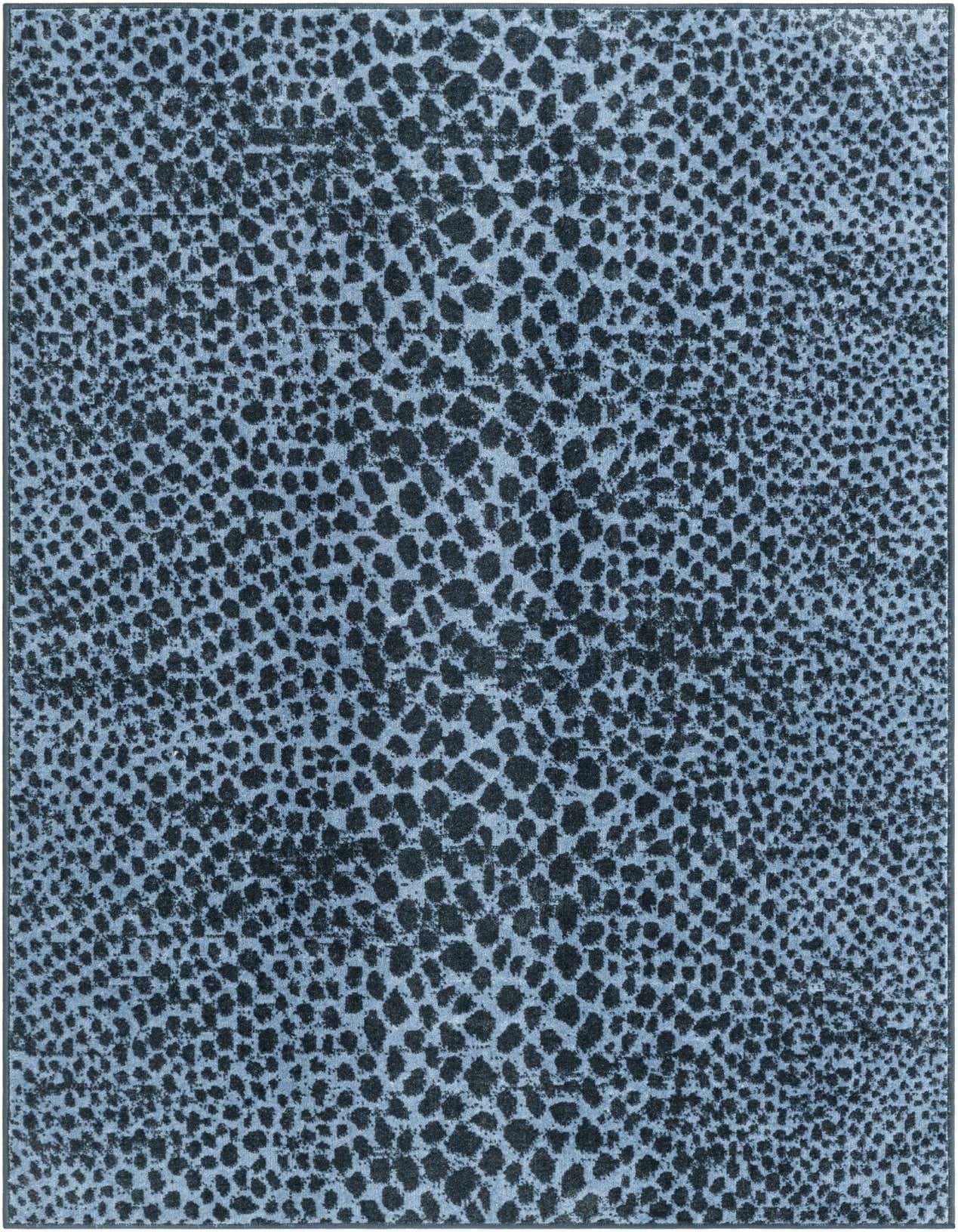 A 4x6 rectangular Kamala Washable rug featuring a modern abstract pattern in varying shades of blue, resembling an animal print.