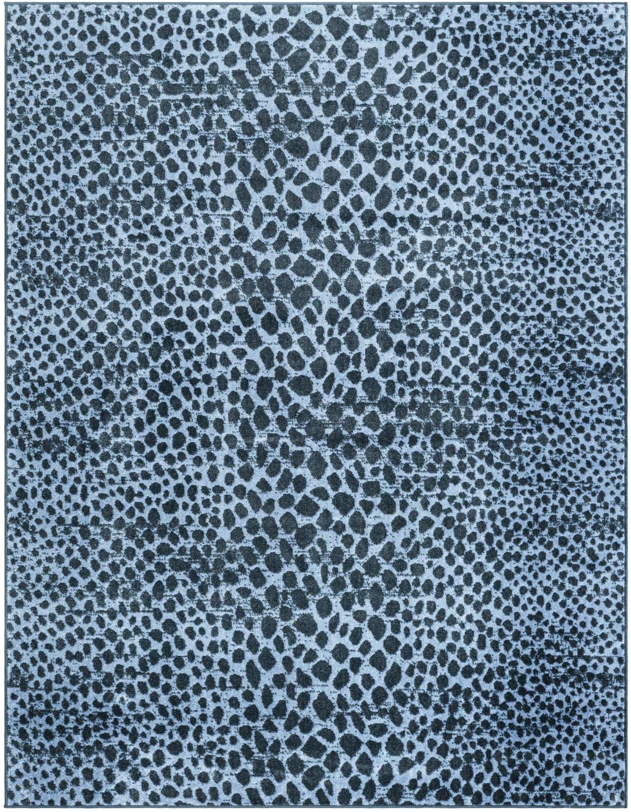 A 5x8 rectangular Kamala Washable rug featuring a modern abstract pattern of dark blue spots on a lighter blue background.