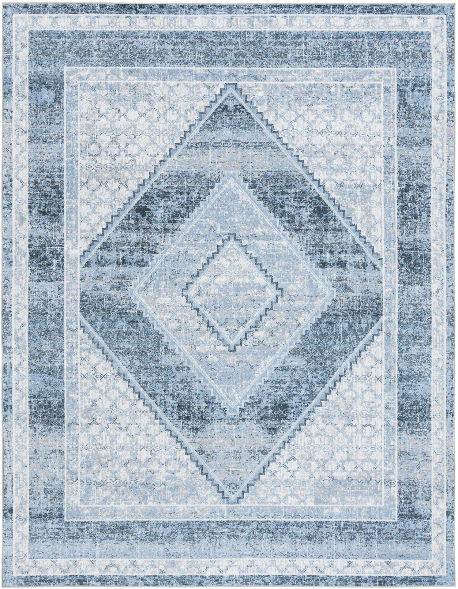 An 8x10 rectangular Kamala Washable rug featuring a distressed traditional medallion pattern in shades of blue and white.