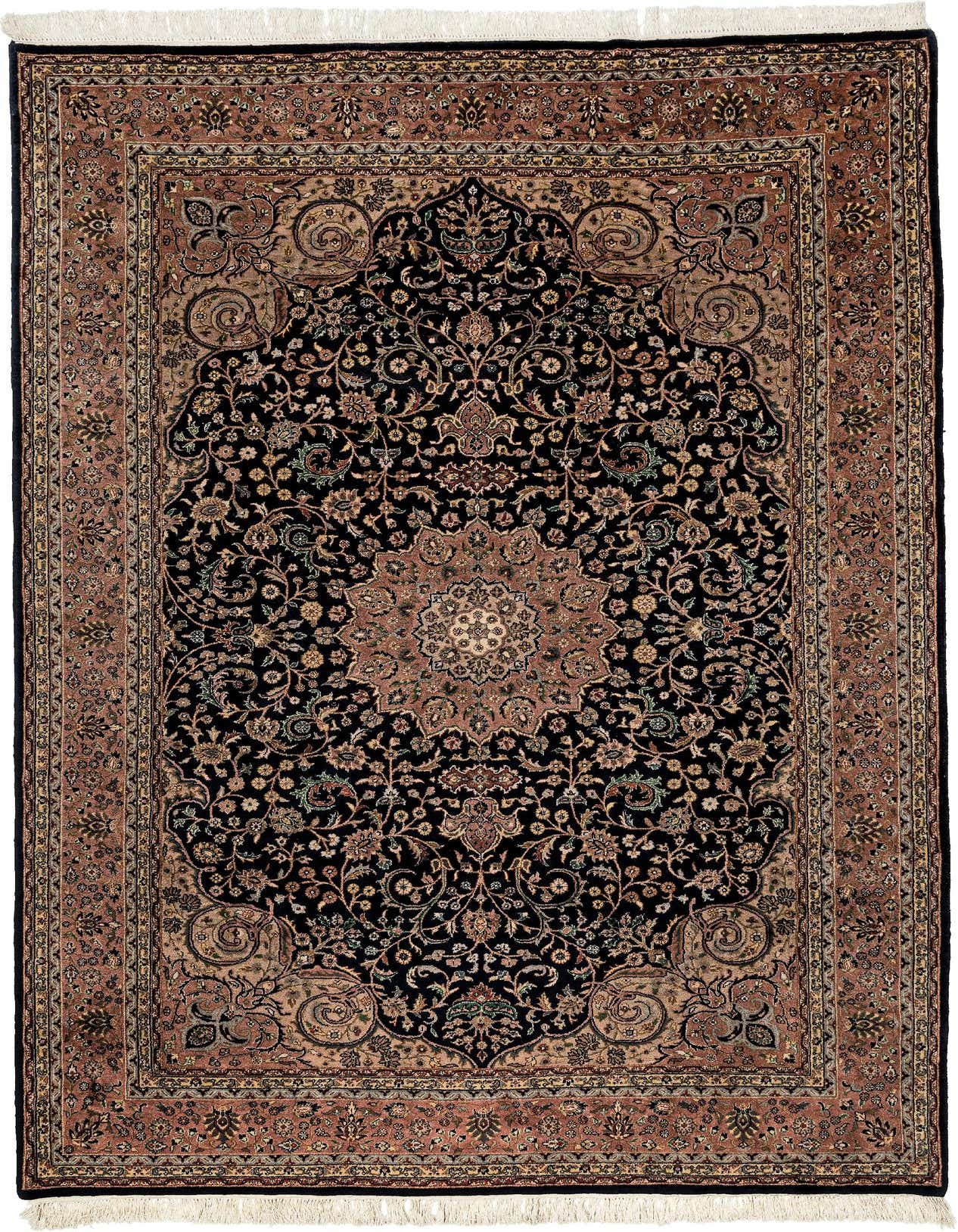 A 7x10 rectangular Kashan rug featuring a traditional Oriental floral pattern in navy blue and warm brown tones with a central medallion.