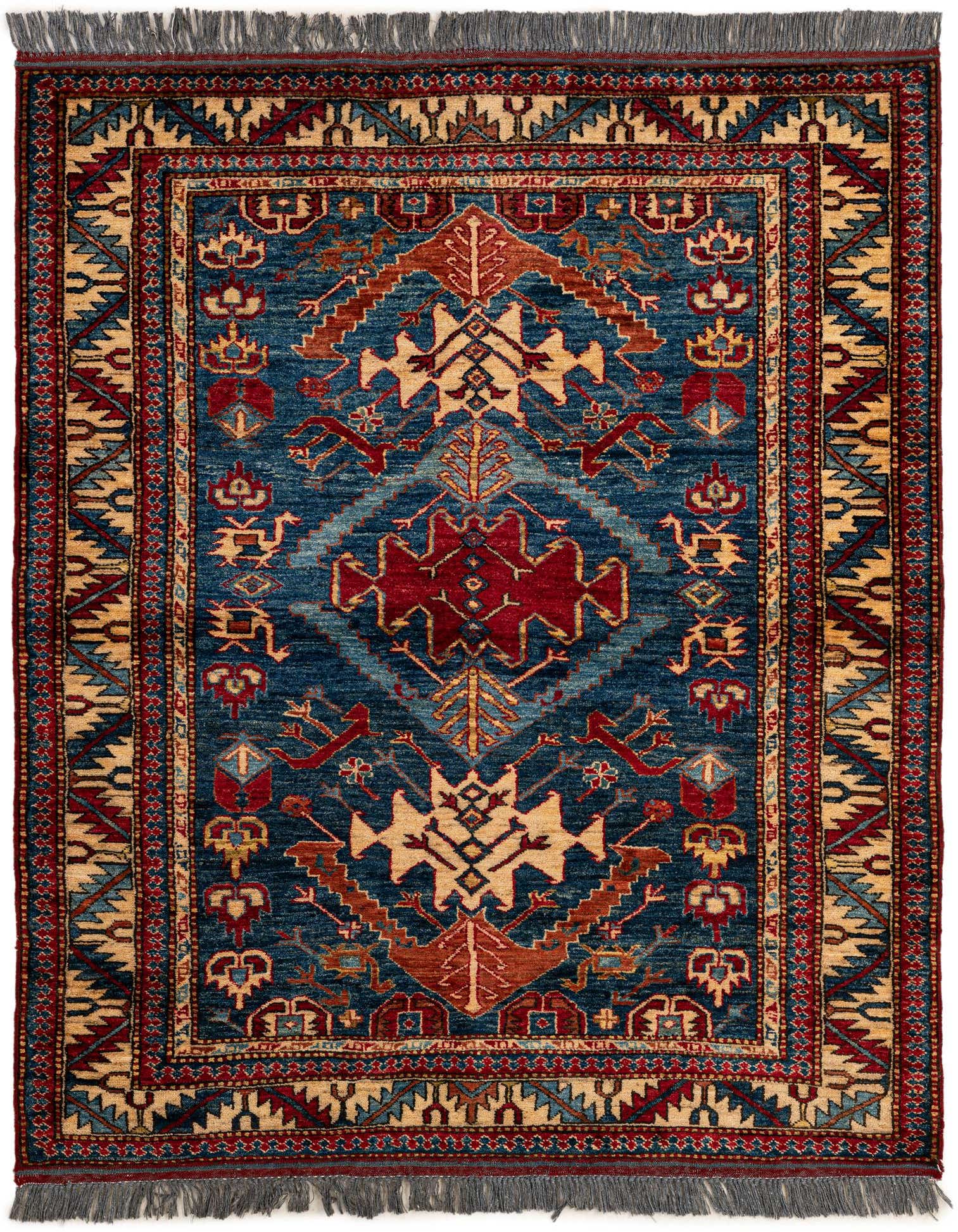 A 4x6 rectangular Rugs.com Kazak rug in rich blues, reds, and creams with a traditional Oriental pattern and fringe.