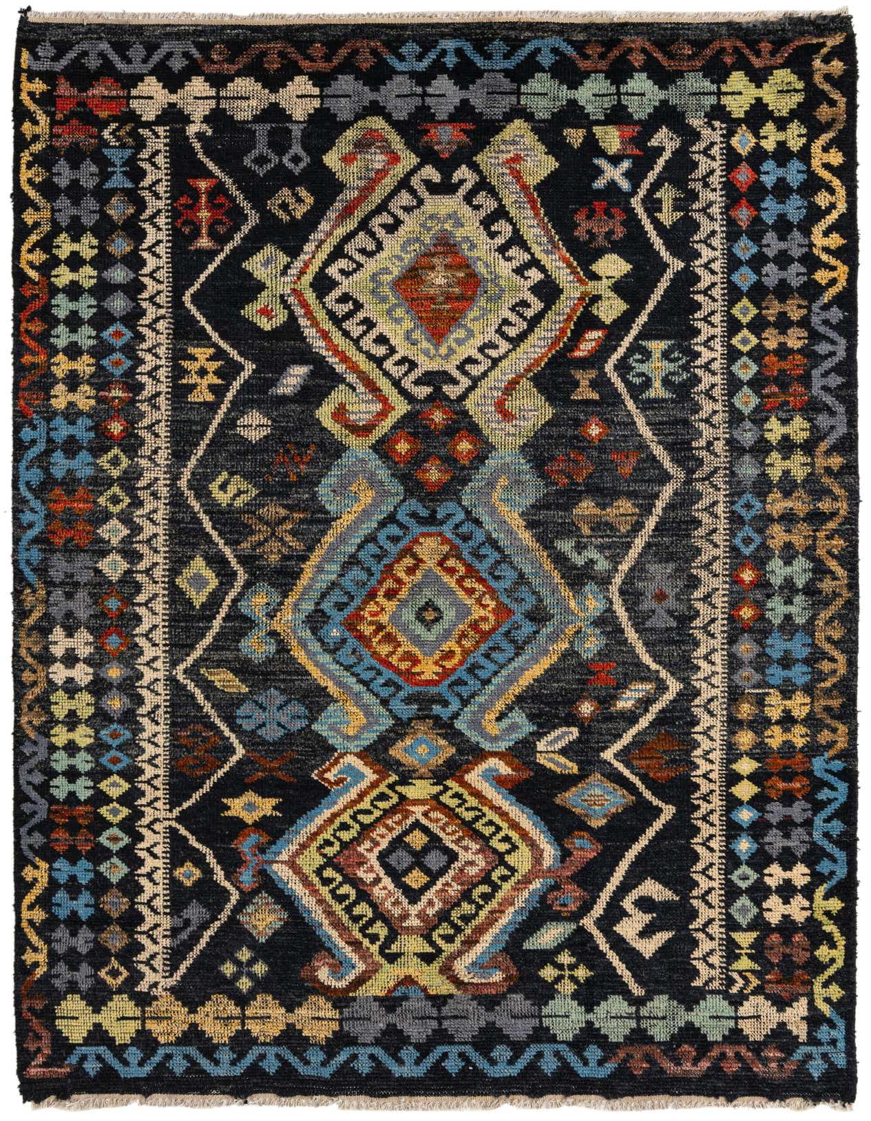 A 5x8 rectangular Kazak rug with a dark navy background and vibrant geometric medallion patterns in blues, reds, yellows, and greens.