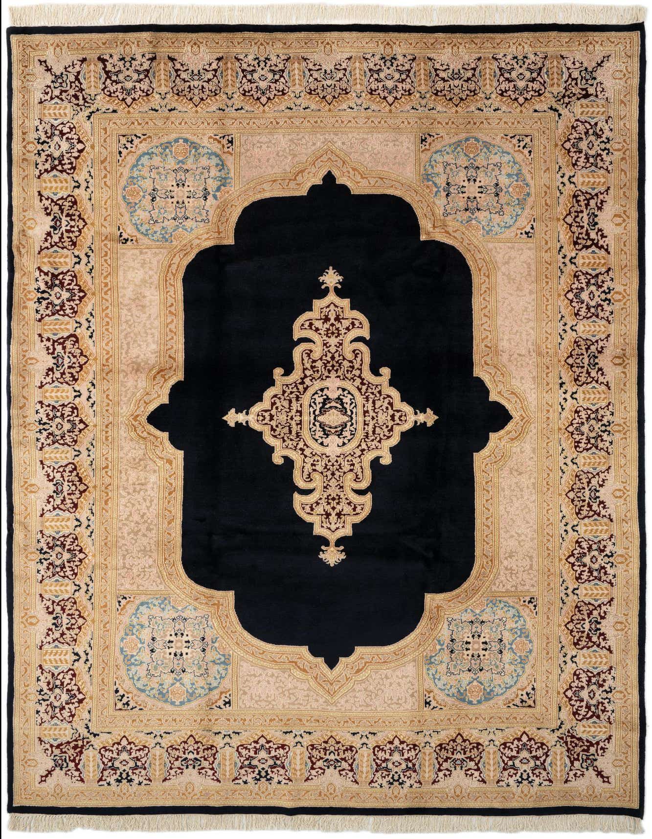 An 8x11 rectangular Kerman rug featuring a central navy blue medallion on a light beige field with intricate traditional patterns.