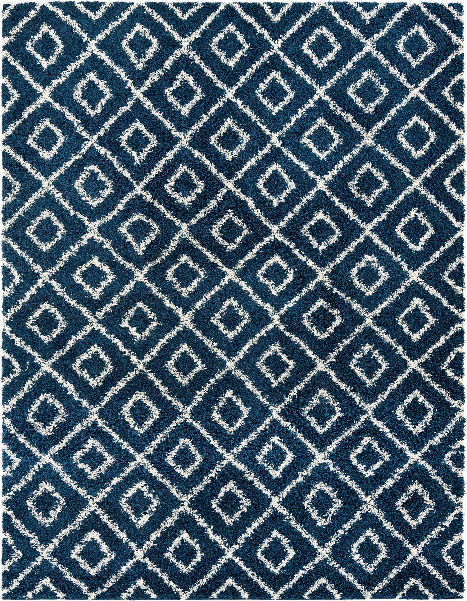 A rectangular 9x12 navy blue shag rug with a white modern lattice pattern, featuring a textured high-low pile.